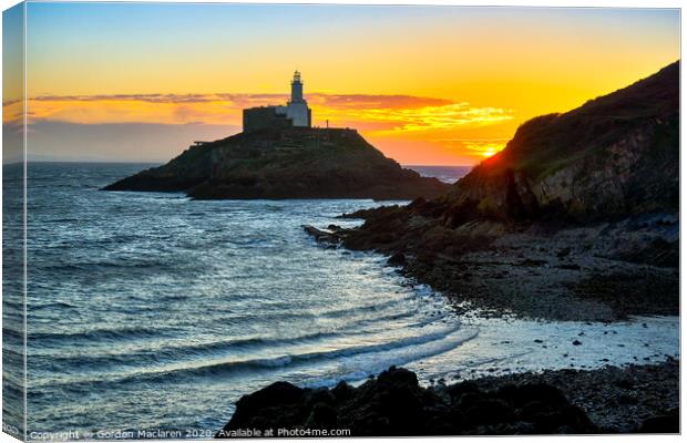 Sunrise over Mumbles Lighthouse Canvas Print by Gordon Maclaren