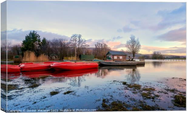 Boats on Llangorse Lake at Sunset Canvas Print by Gordon Maclaren