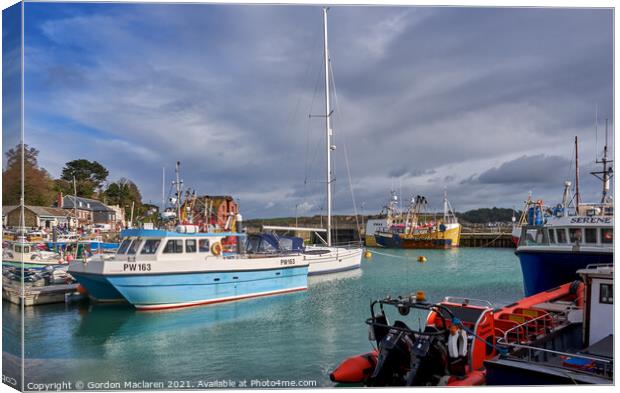 Boats moored in Padstow Harbour Cornwall Canvas Print by Gordon Maclaren