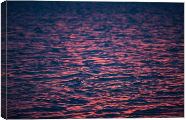 Water ripples in sunset. Canvas Print by Alexey Rezvykh