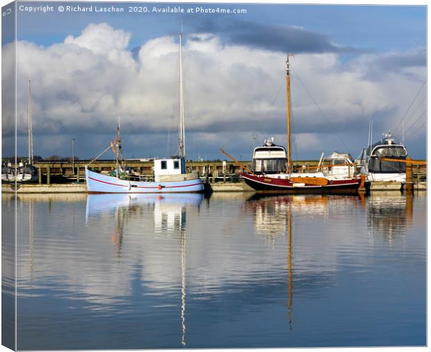 Fishing ships in harbour Canvas Print by Richard Laschon