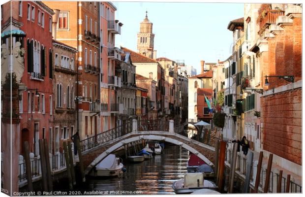 Beautiful canal scene in Venice Canvas Print by Paul Clifton