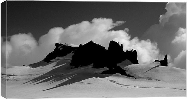 Iceland  - Rock peaks Vatnajokull glacier  Canvas Print by David Turnbull