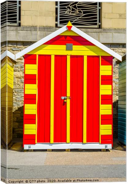 Red and yellow house on the beach, colorful door t Canvas Print by Q77 photo