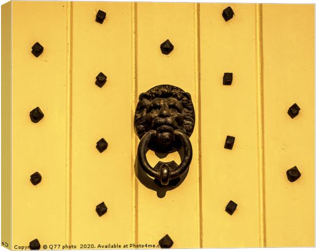 Door with brass knocker in the shape of a lion's h Canvas Print by Q77 photo
