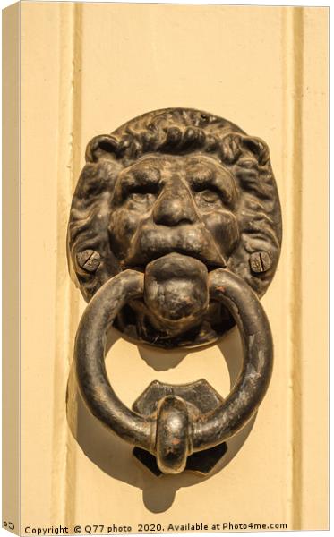 Door with brass knocker in the shape of a lion's h Canvas Print by Q77 photo