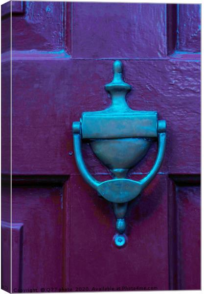 Door with brass knocker in the shape of a hand, be Canvas Print by Q77 photo