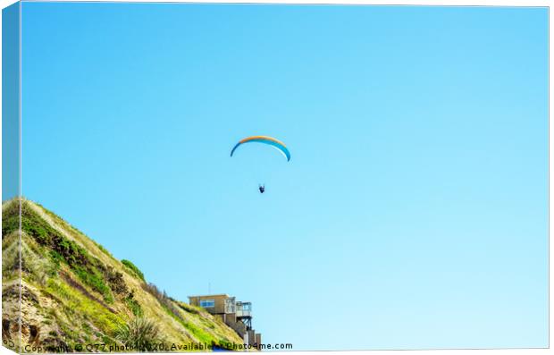 Paraglider flying in the sky, free time spent acti Canvas Print by Q77 photo