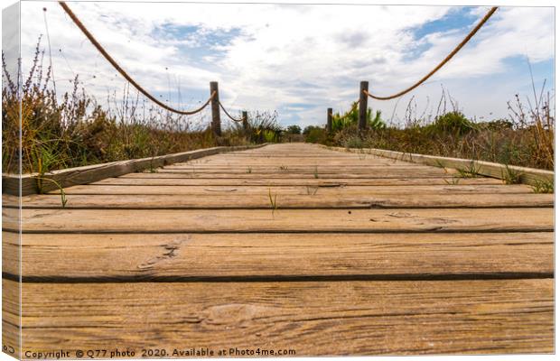 wooden boardwalk in the dunes leading to the sandy Canvas Print by Q77 photo