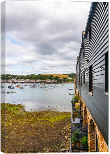 Boats and ships moored in a small port, in the bac Canvas Print by Q77 photo