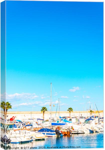 Beautiful luxury yachts and motor boats anchored i Canvas Print by Q77 photo