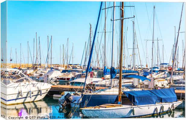 Beautiful luxury yachts and motor boats anchored i Canvas Print by Q77 photo