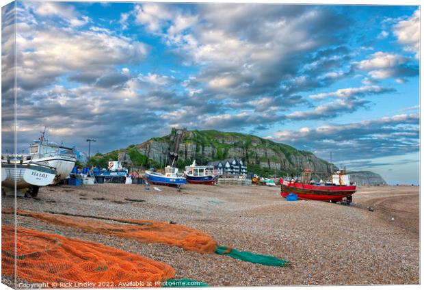 Fishing Boats On Hastings Beach With Evening Sky Canvas Print by Rick Lindley