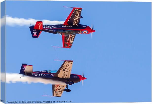 The Blades Mirror Formation Canvas Print by Rick Lindley