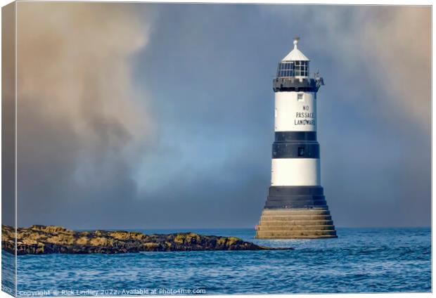 Penmon Lighthouse Canvas Print by Rick Lindley