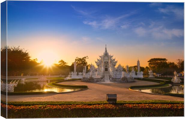 Wat Rong Khun in Chiang Rai at sunset Canvas Print by Anahita Daklani-Zhelev