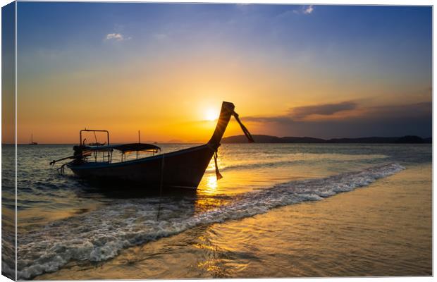 Sunset Scene over sea whit Longtail Boat Canvas Print by Jordan Jelev