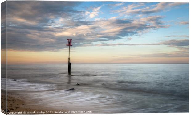 Evening light on the beach at Caister-on-Sea Canvas Print by David Powley