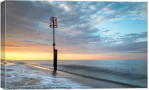 Sunset on the beach at Caister-on-Sea Norfolk Canvas Print by David Powley