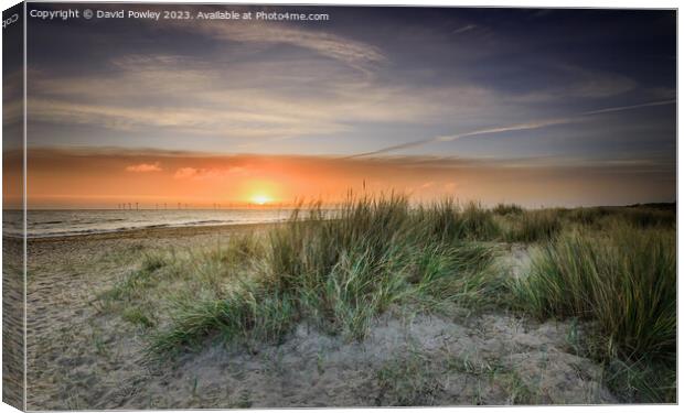 Peaceful Sunrise on Caister Beach Canvas Print by David Powley