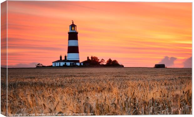 Fire Sky Over Happisburgh Lighthouse Canvas Print by David Powley