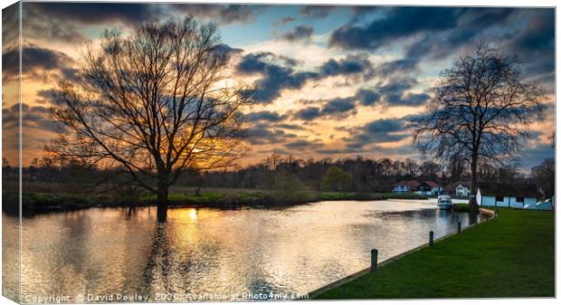 Sunset over the river at Coltishall Norfolk Canvas Print by David Powley