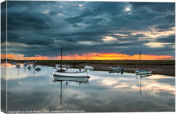 Stormy sunset over Burnham Overy Staithe Canvas Print by David Powley