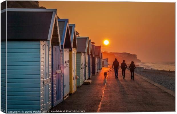 Sunset Walk on Cromer Seafront  Canvas Print by David Powley