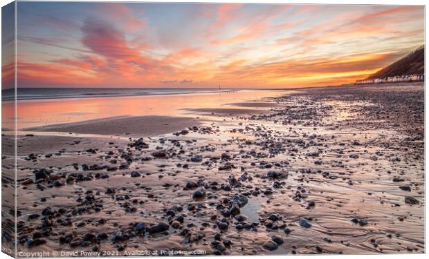 Sunrise Sky Over Cromer Beach Norfolk Canvas Print by David Powley