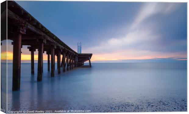 Sunrise over Claremont Pier Lowestoft Suffolk Canvas Print by David Powley