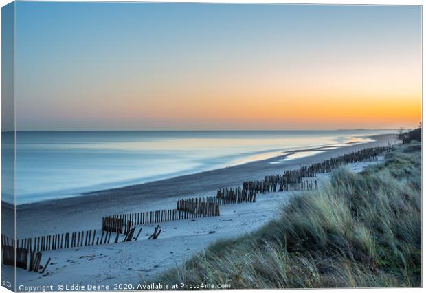 Sunrise at Holme beach Canvas Print by Eddie Deane