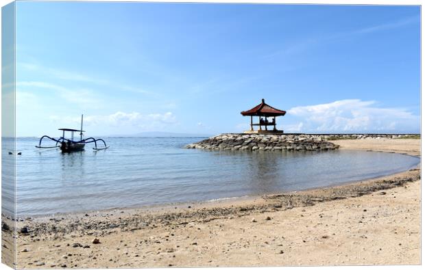 Bali beach with small cabin and boat Canvas Print by Theo Spanellis