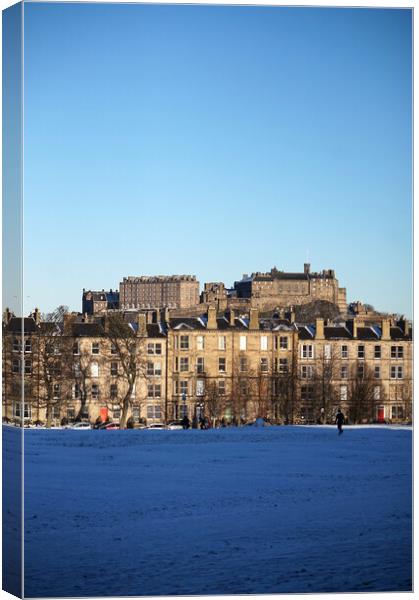 Edinburgh castle behind the snowy park Canvas Print by Theo Spanellis