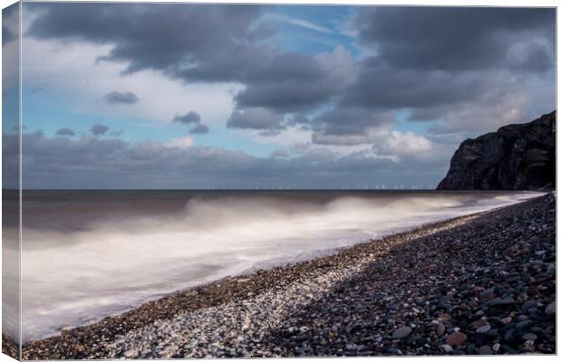 Waves Crashing on a beach in North Wales Canvas Print by Christopher Stores