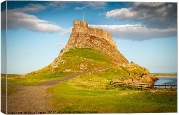 Majestic Lindisfarne Castle on Holy Island Canvas Print by Clive Ingram