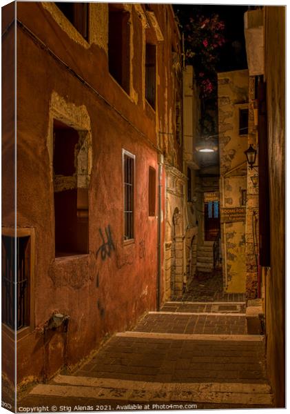The creepy Moschon alley in the middle of the night lit by a str Canvas Print by Stig Alenäs