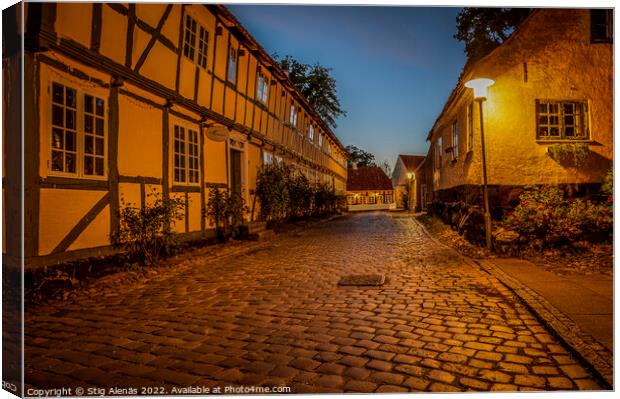 streetlamp at twilight hour in the old cobbled street Canvas Print by Stig Alenäs