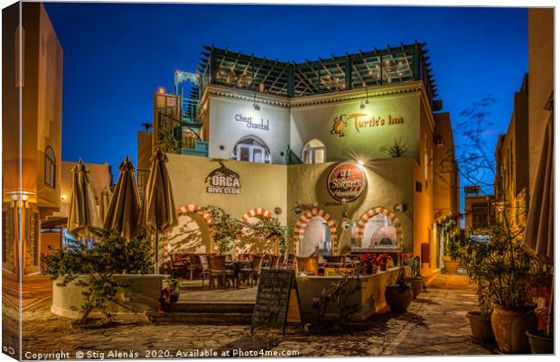 A colourful picturesque restaurant illuminated at  Canvas Print by Stig Alenäs