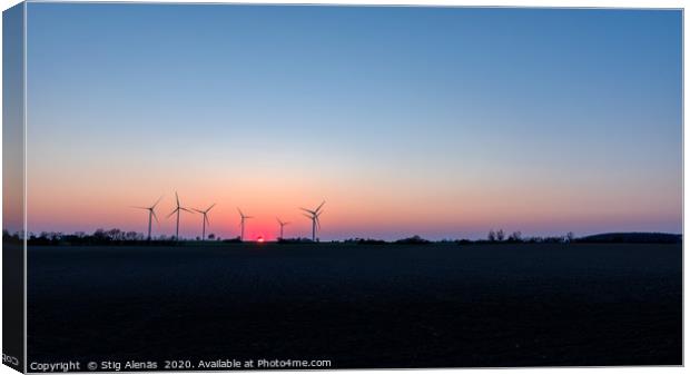 windmills in the sunset over the plain Canvas Print by Stig Alenäs