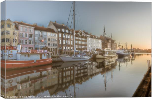 Colourful houses in the sunrise along the quay at  Canvas Print by Stig Alenäs