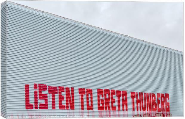 Listen to Greta Thunberg, a text message on a wall Canvas Print by Stig Alenäs