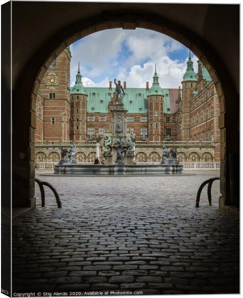 Entrance through a dark gate under an arch to Frederiksborg cast Canvas Print by Stig Alenäs
