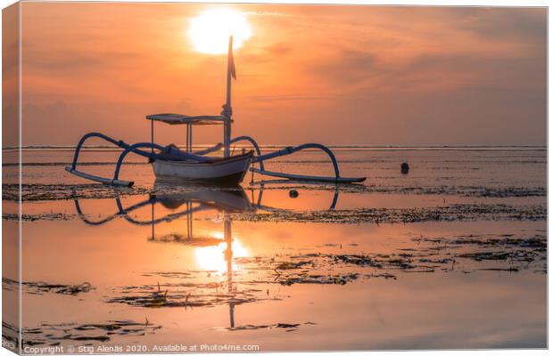 A traditional balinese fishing boat at sunrise Canvas Print by Stig Alenäs