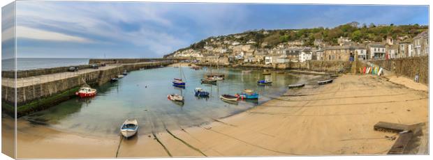 Boats moored in Mousehole harbour, Cornwall Canvas Print by Mick Blakey