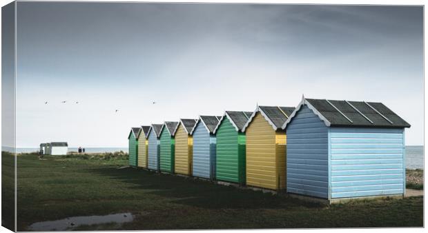 Beach Huts, Littlehampton Canvas Print by Mark Jones
