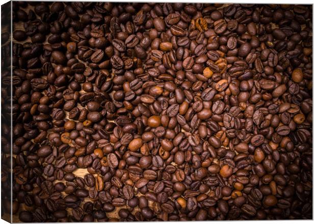 Coffee beans as background picture - top down view Canvas Print by Erik Lattwein