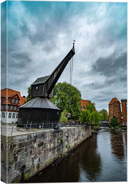 Old crane at the Historic city of Luneburg Germany - CITY OF LUENEBURG, GERMANY - MAY 10, 2021 Canvas Print by Erik Lattwein
