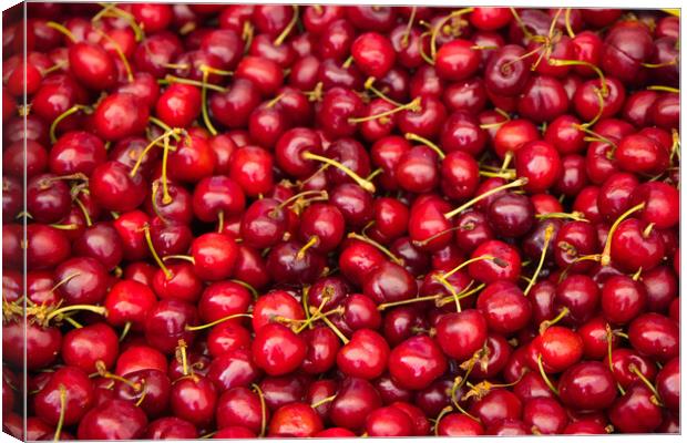 Fresh cherries for sale on the market - city photography Canvas Print by Erik Lattwein