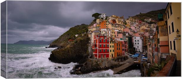 Colorful houses of Riomaggiore at the Italian west coast - Cinqu Canvas Print by Erik Lattwein