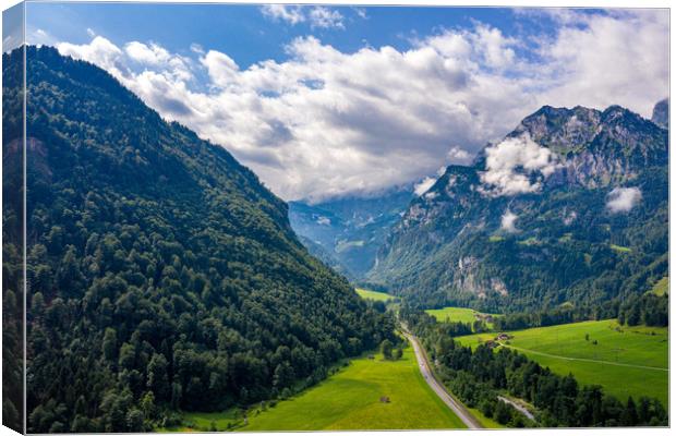 Wonderful aerial view over a valley in the Swiss A Canvas Print by Erik Lattwein